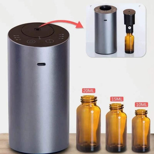 Waterless Car Scent Diffuser Nebulizer, Smart Sleep Device with shown essential oil bottles for easy use.