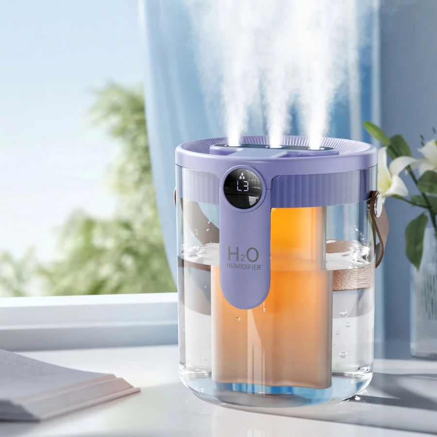 1.5L Triple Jet Humidifier in purple with nano mist, warm ambient lighting, portable handle, and digital display emitting powerful triple spray on a bright table