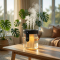 Humidifier on a wooden table with plants and a couch in the background