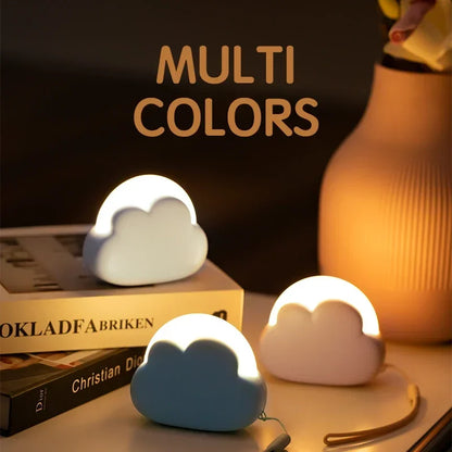 Aesthetic LED cloud night light lamp glowing softly white and blue on bedroom shelf