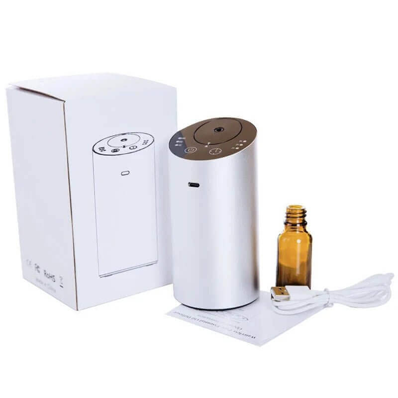 Waterless Car Scent Diffuser Nebulizer, Smart Sleep Device with packaging and accessories including USB cable.