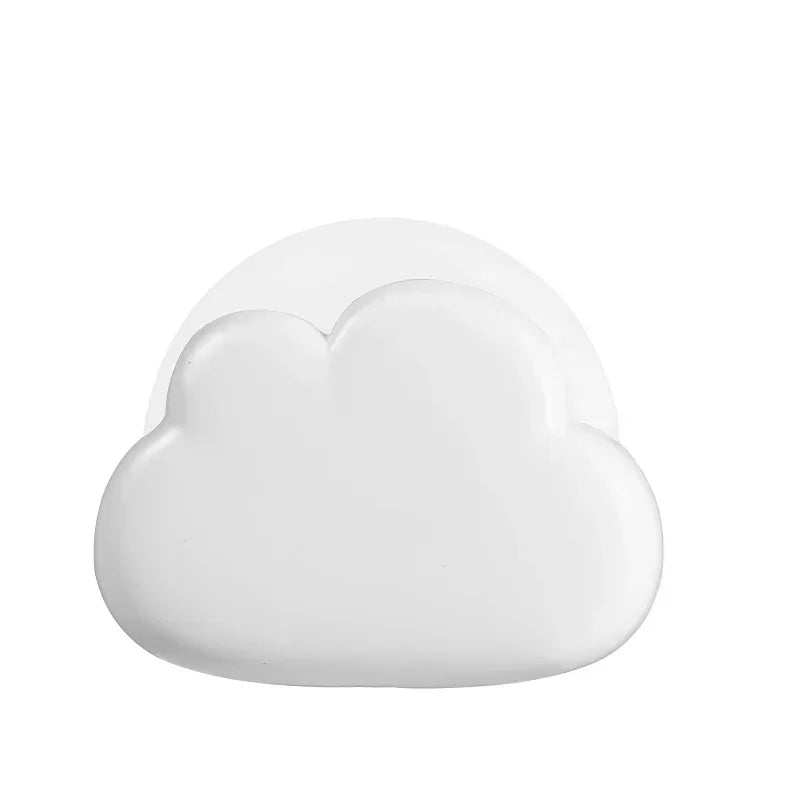 Aesthetic LED cloud night light lamp glowing softly white and blue on bedroom shelf